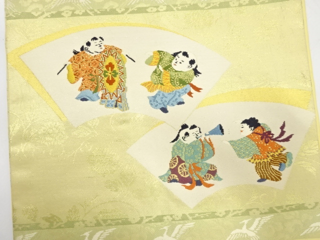 アンティーク　地紙に御所人形・草花模様織り出し名古屋帯